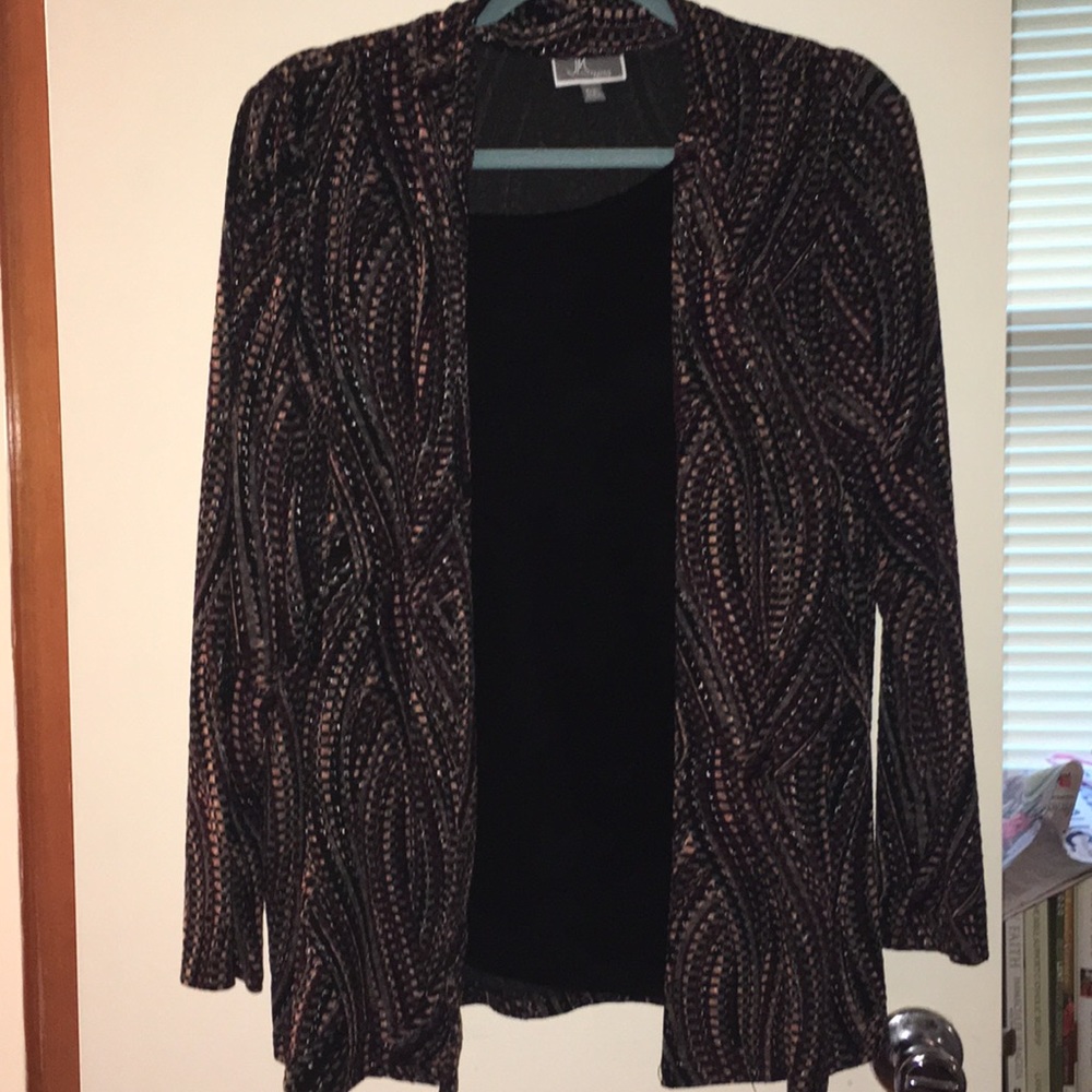 Dressy top with attached jacket. Perfect for fall